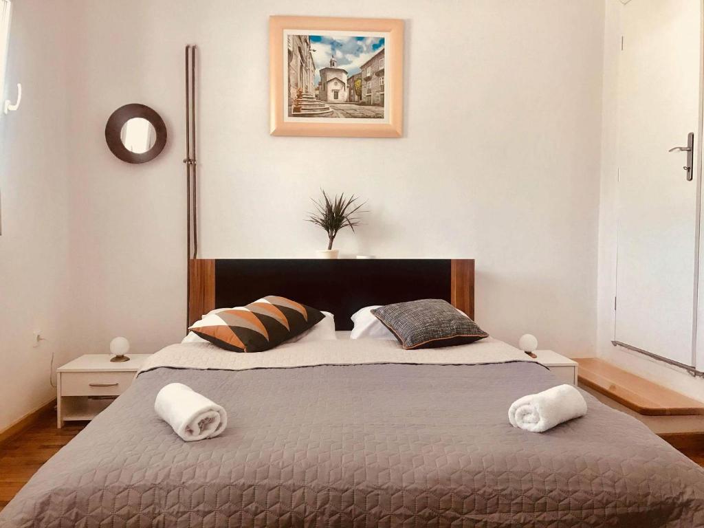 Posteľ alebo postele v izbe v ubytovaní Anamarija apartment