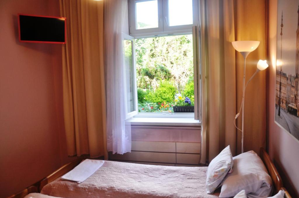 Postel nebo postele na pokoji v ubytování Apartament Różana przy ICE