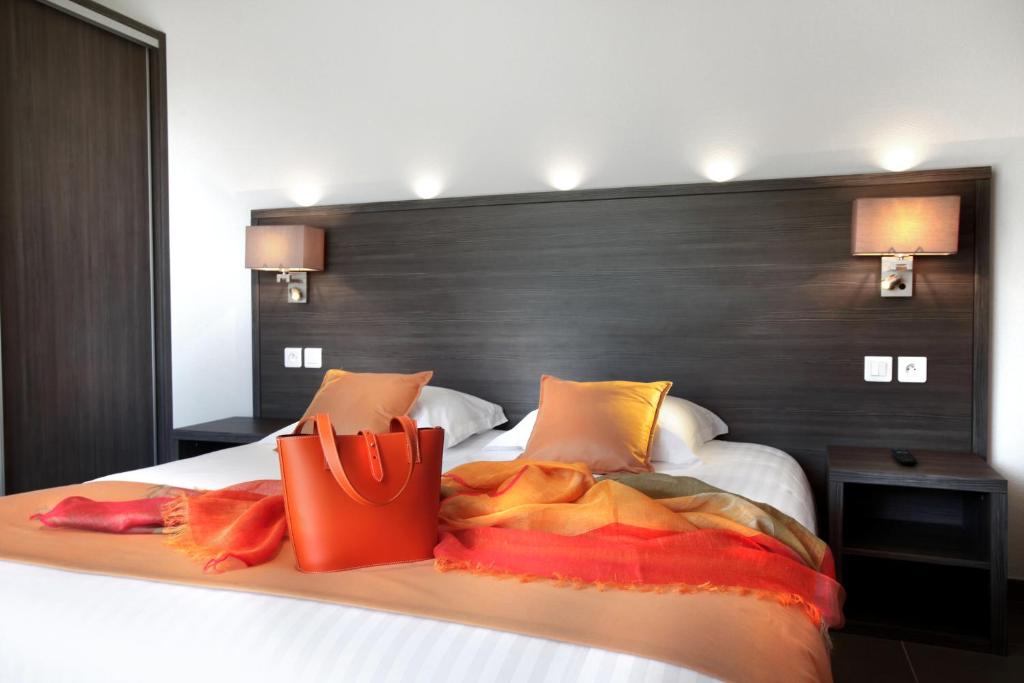 Postel nebo postele na pokoji v ubytování Seventeen Hotel