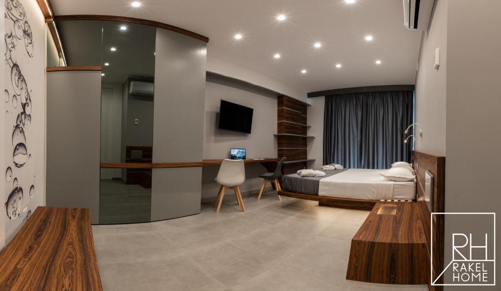 A bed or beds in a room at B&B Rakel Home