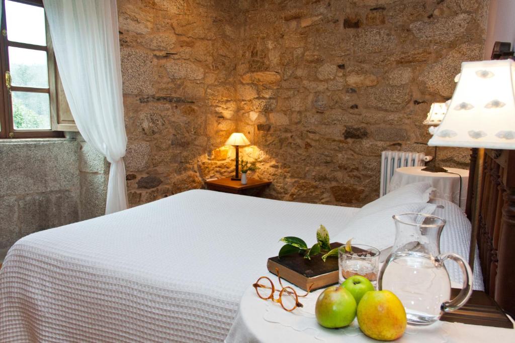 Cama o camas de una habitación en Casa Rural Graña da Acea