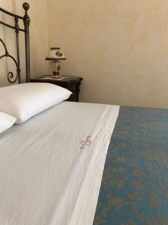 Postel nebo postele na pokoji v ubytování Villa Belvedere di Rita