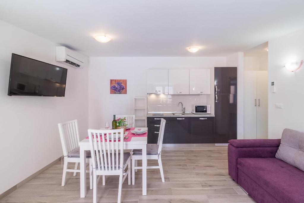 Kuchyň nebo kuchyňský kout v ubytování Apartment Taja