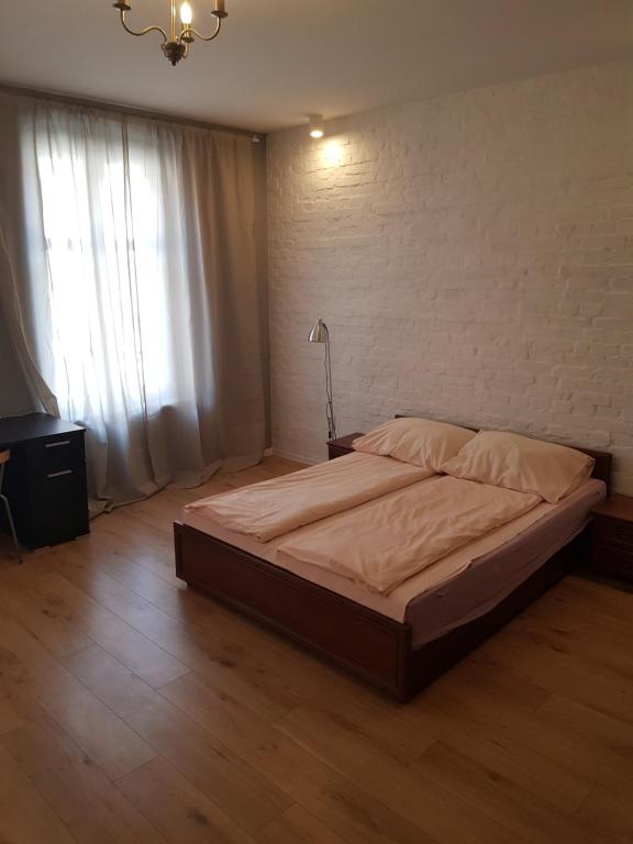 Postel nebo postele na pokoji v ubytování Kaktus Guest House