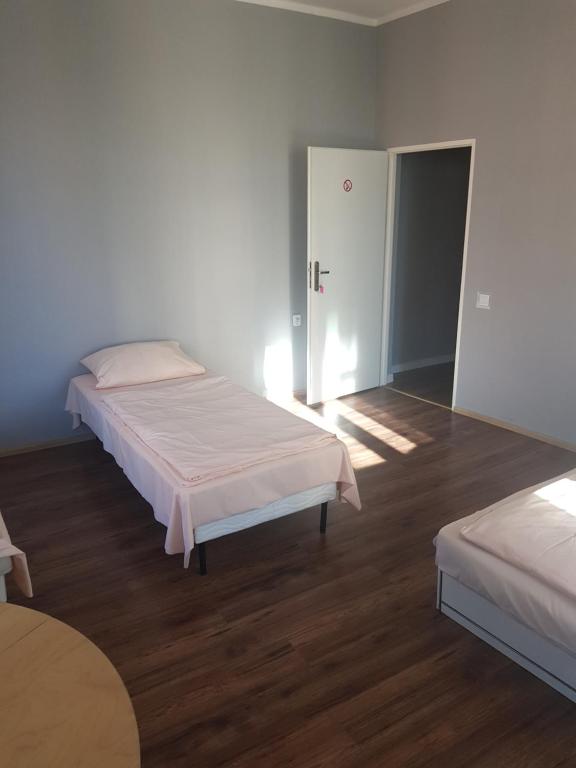 Postel nebo postele na pokoji v ubytování Kaktus Guest House