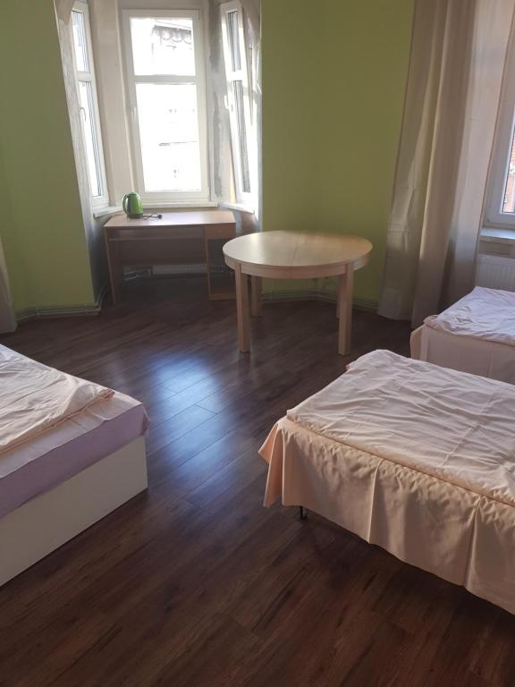 Postel nebo postele na pokoji v ubytování Kaktus Guest House