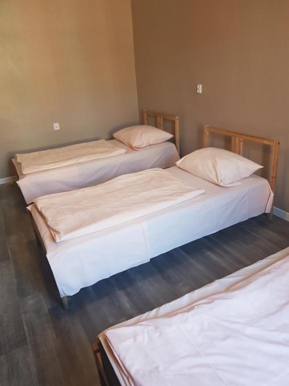 Postel nebo postele na pokoji v ubytování Kaktus Guest House