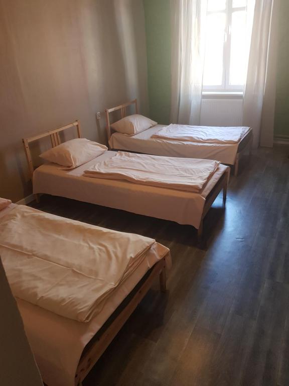 Postel nebo postele na pokoji v ubytování Kaktus Guest House