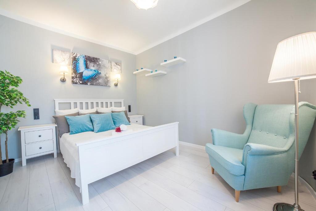 Posteľ alebo postele v izbe v ubytovaní Apartments Madelaine Warsaw by Noclegi Renters