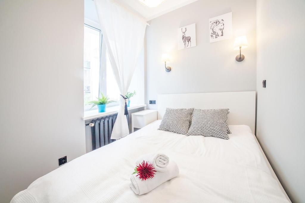 Posteľ alebo postele v izbe v ubytovaní Apartments Madelaine Warsaw by Noclegi Renters