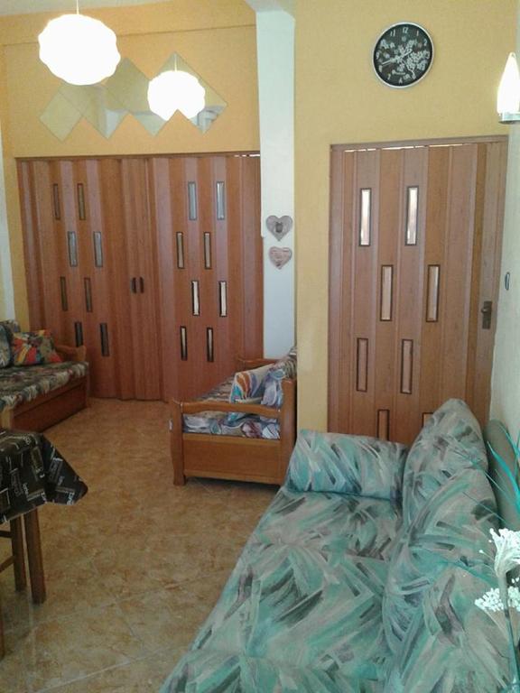 Łóżko lub łóżka w pokoju w obiekcie Gatos Apartment