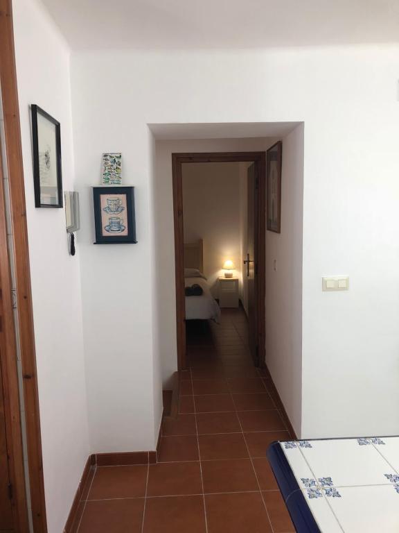 Postel nebo postele na pokoji v ubytování Casa Neus