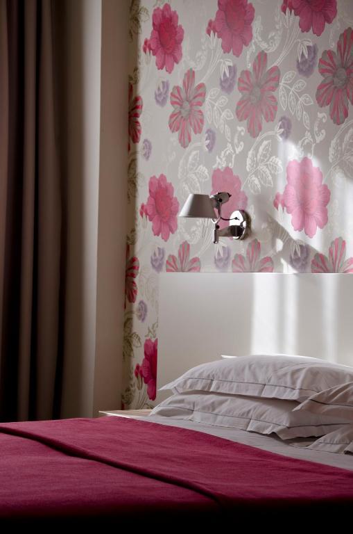 Postel nebo postele na pokoji v ubytování Key Hotel