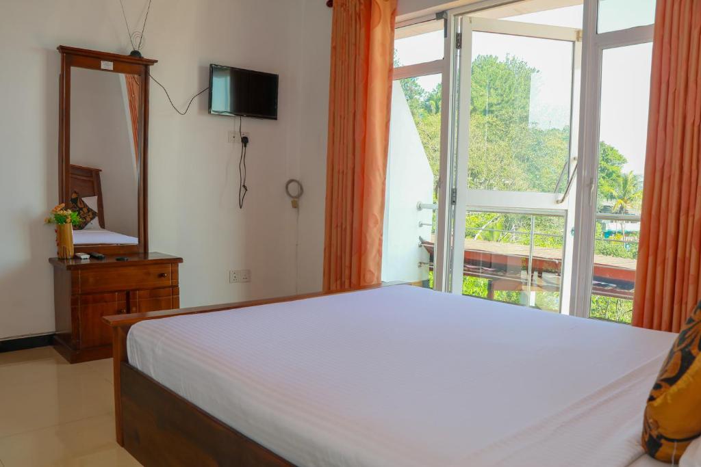 Postel nebo postele na pokoji v ubytování Mount Palace