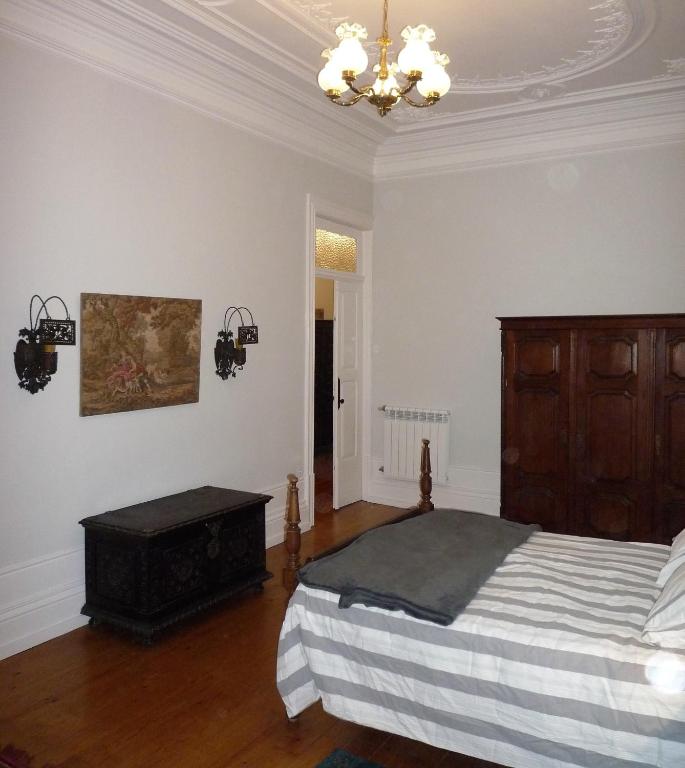 Postel nebo postele na pokoji v ubytování Casa Familiar do Porto