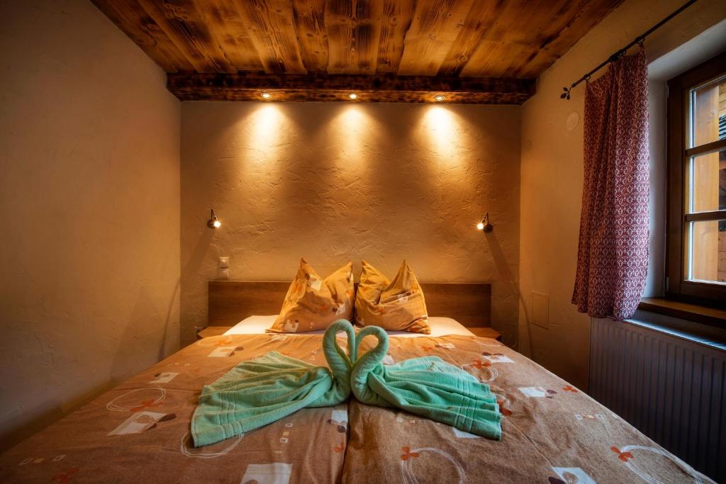 Postel nebo postele na pokoji v ubytování Chata Piecky