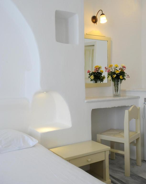 Postel nebo postele na pokoji v ubytování Carlo Bungalows