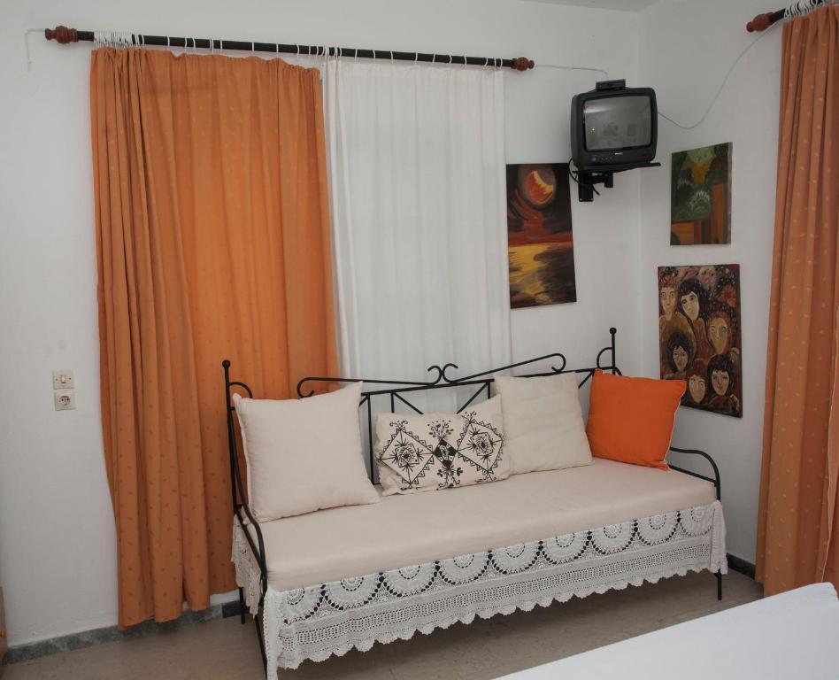 Postel nebo postele na pokoji v ubytování Nakou House