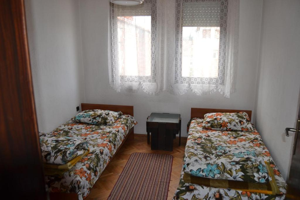 Postel nebo postele na pokoji v ubytování Hostel Valentin