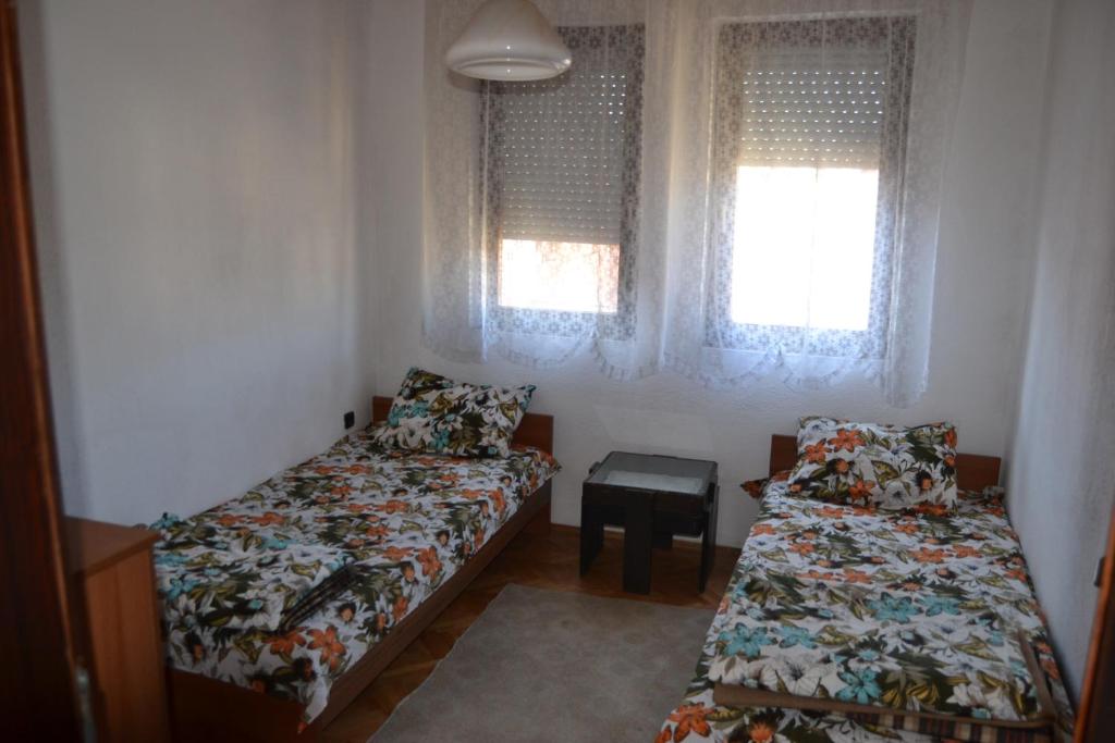 Postel nebo postele na pokoji v ubytování Hostel Valentin