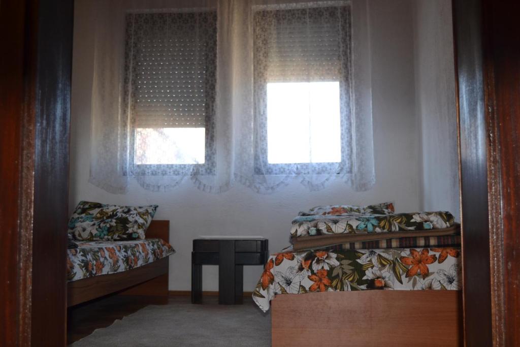 Postel nebo postele na pokoji v ubytování Hostel Valentin