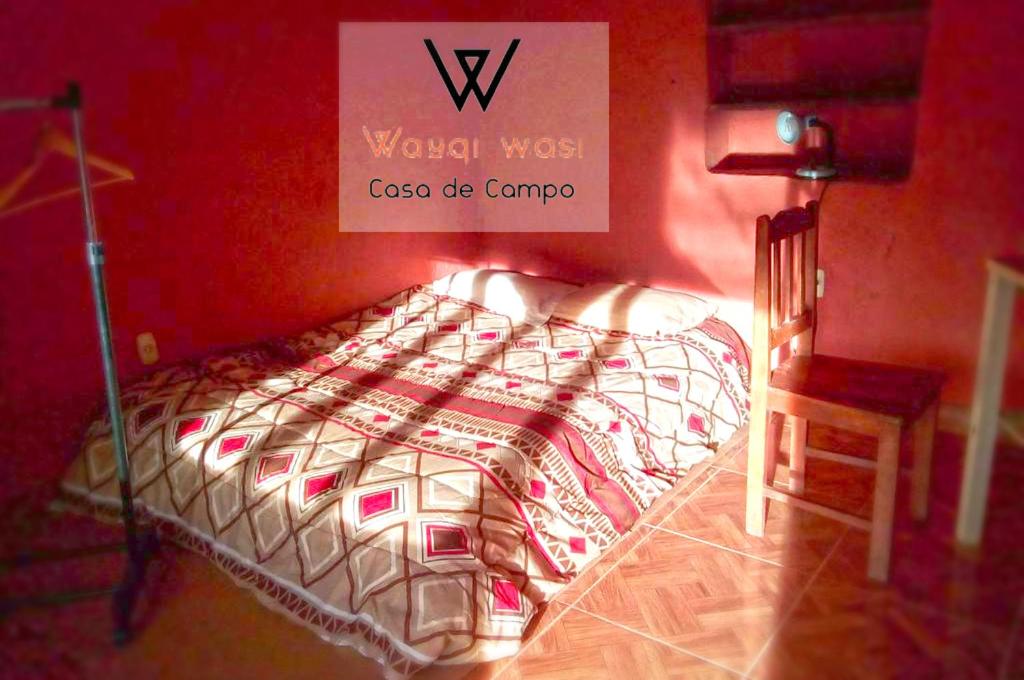 Postel nebo postele na pokoji v ubytování Wayqi Wasi