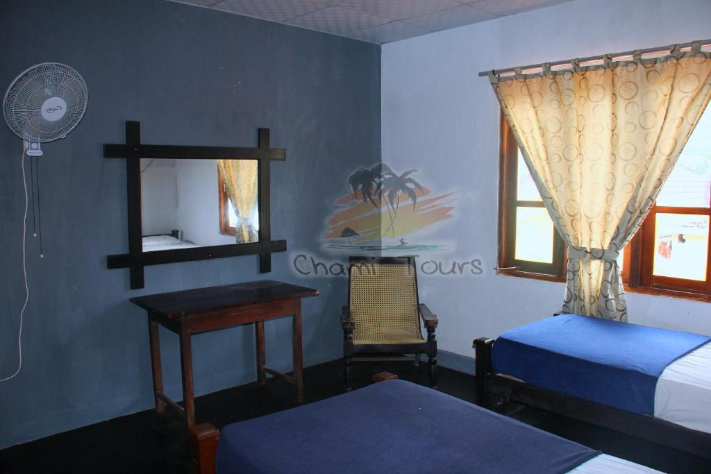 Postel nebo postele na pokoji v ubytování Airport Tourist Hostel
