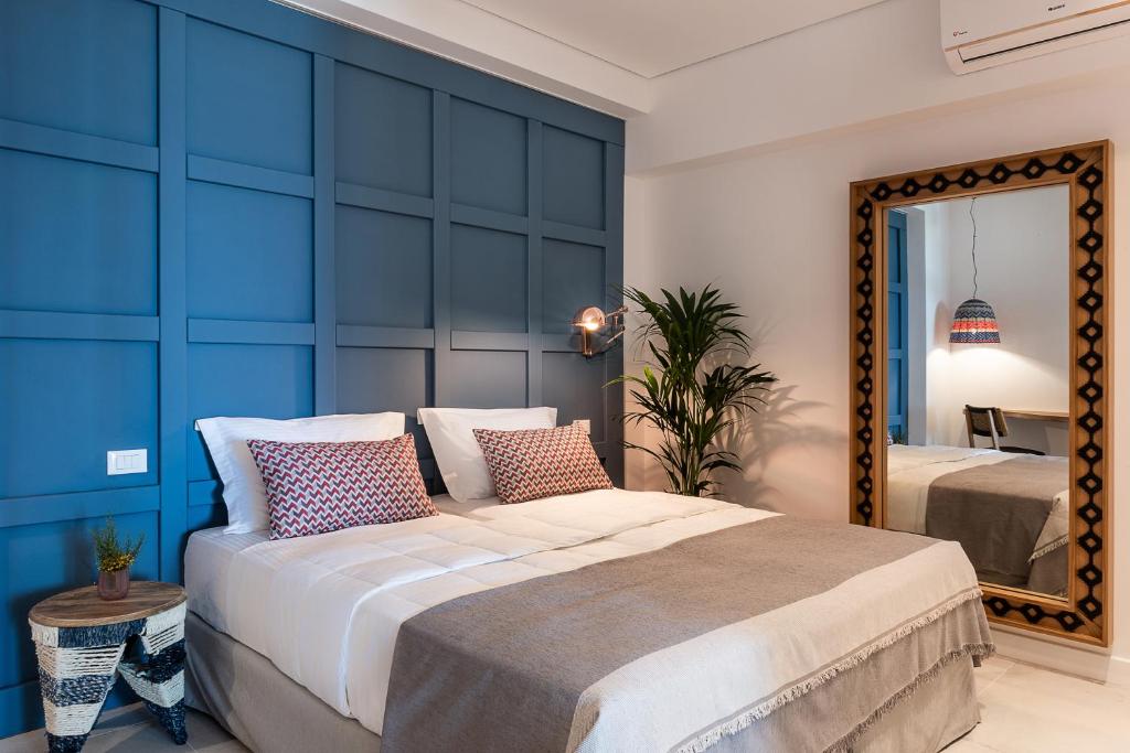 Posteľ alebo postele v izbe v ubytovaní Blue Island Luxury Apartment