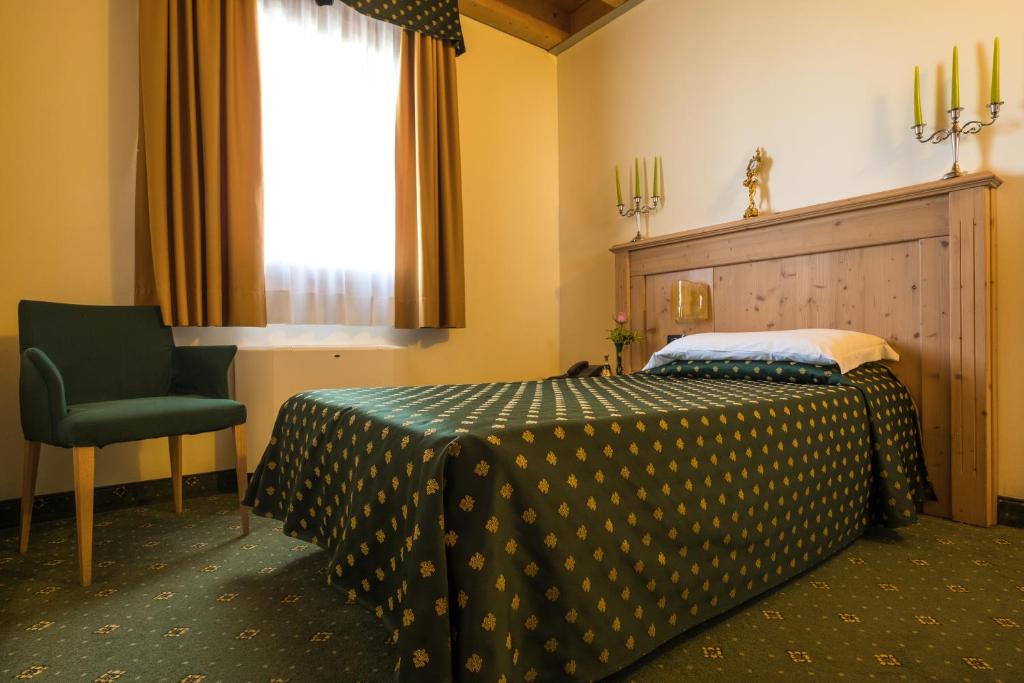 Postel nebo postele na pokoji v ubytování Hotel Dall'Ongaro