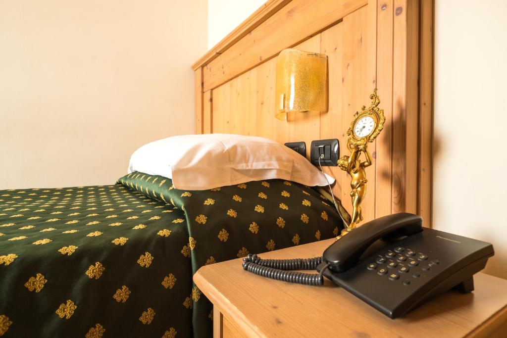 Postel nebo postele na pokoji v ubytování Hotel Dall'Ongaro