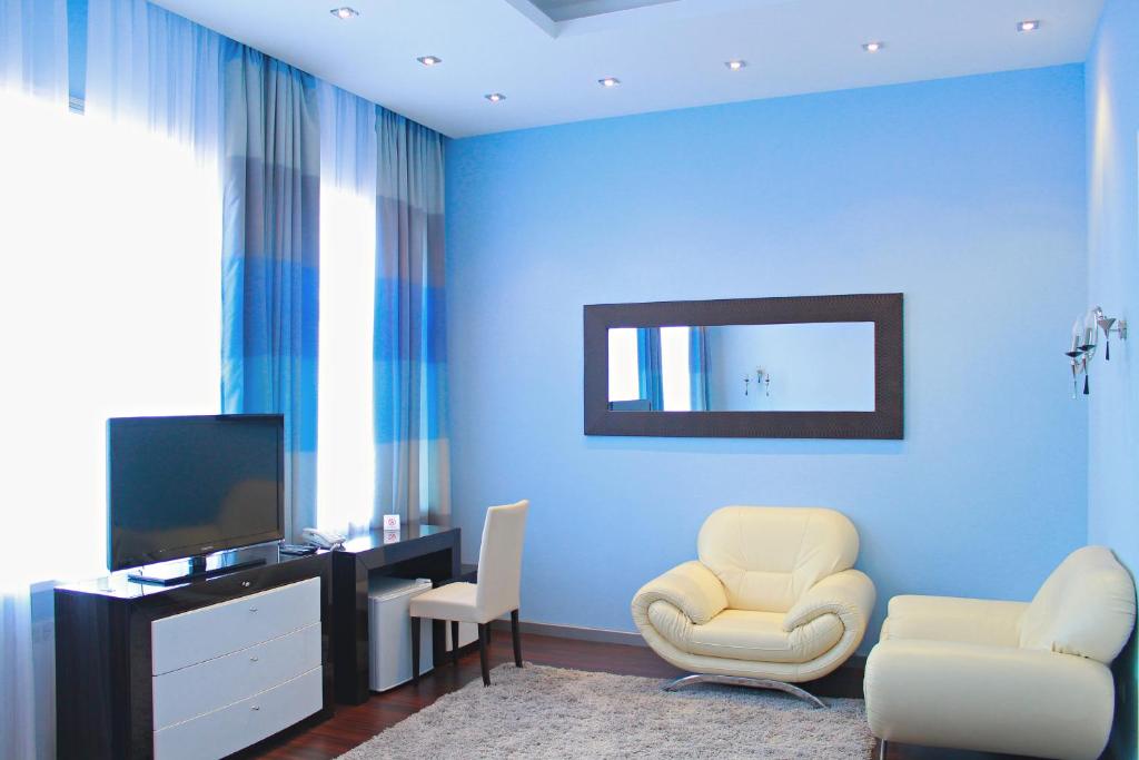 TV a/nebo společenská místnost v ubytování Hotel Dom Aktera