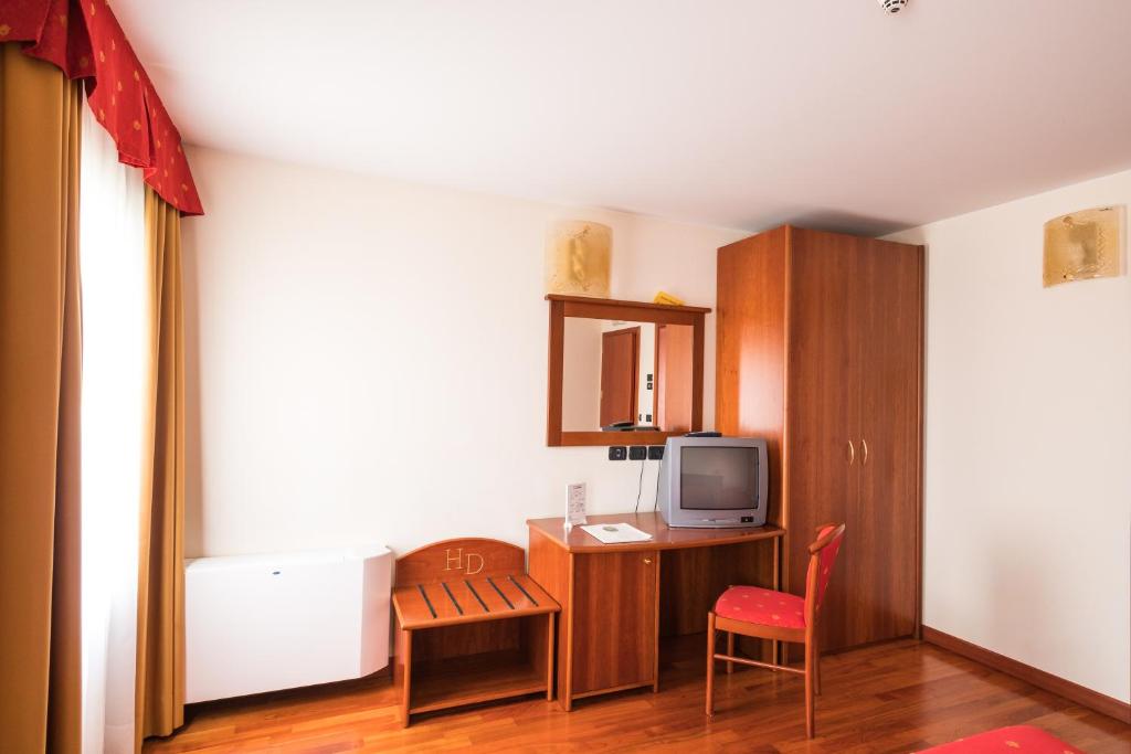 TV a/nebo společenská místnost v ubytování Hotel Dall'Ongaro