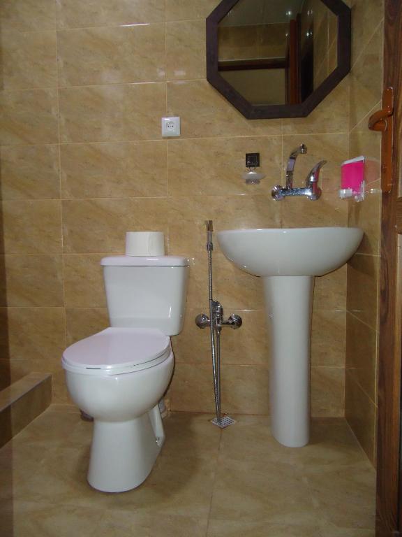 Koupelna v ubytování Hotel Nikala