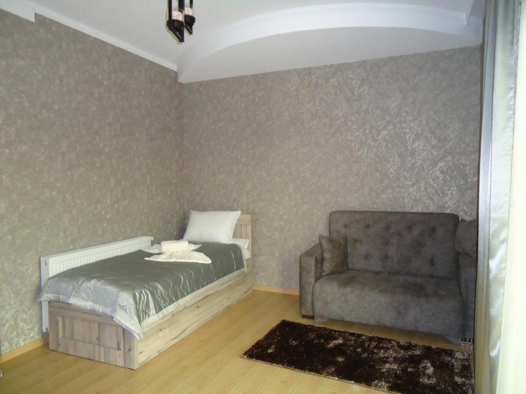 Postel nebo postele na pokoji v ubytování Hotel Nikala