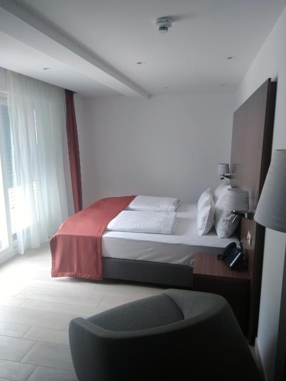 Posteľ alebo postele v izbe v ubytovaní Aparthotel Miramare