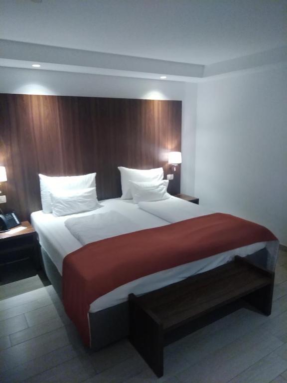 Posteľ alebo postele v izbe v ubytovaní Aparthotel Miramare