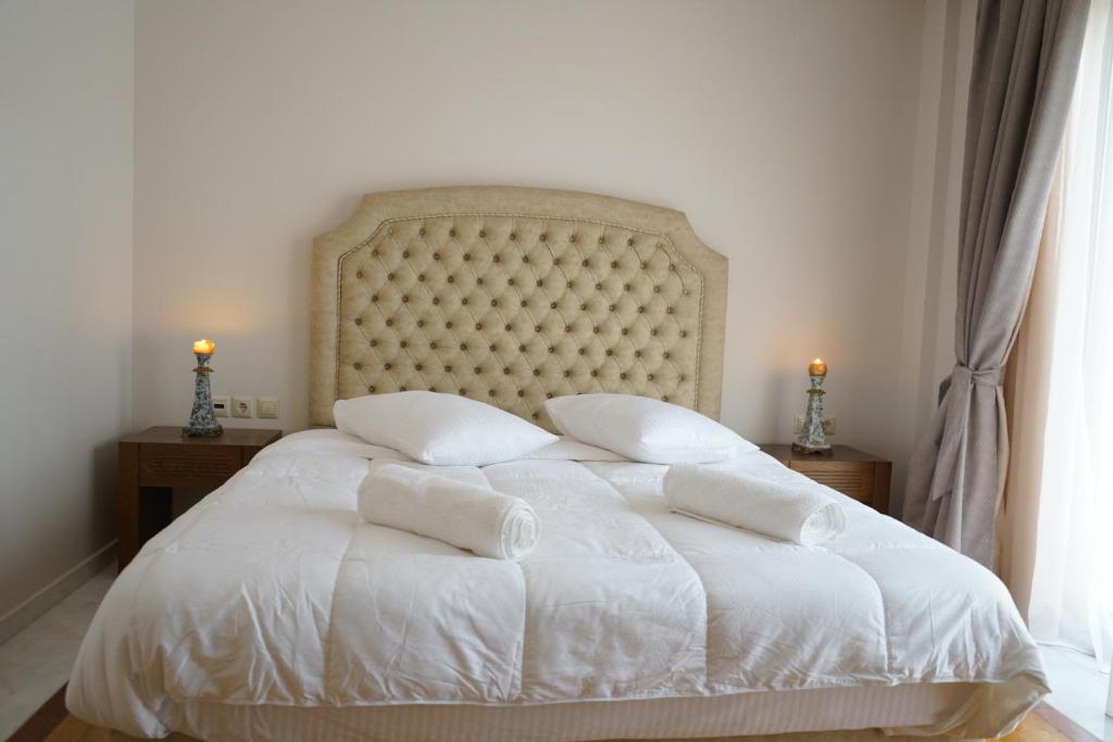 Posteľ alebo postele v izbe v ubytovaní Corali Resort