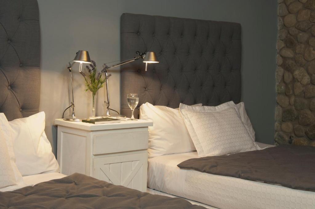 Cama ou camas em um quarto em Blanca Patagonia Hostería Boutique y Cabañas