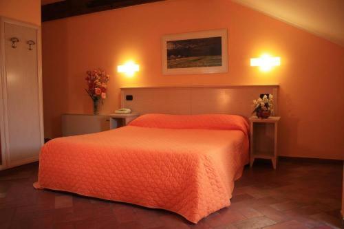 Łóżko lub łóżka w pokoju w obiekcie Hotel Excelsior Splendide
