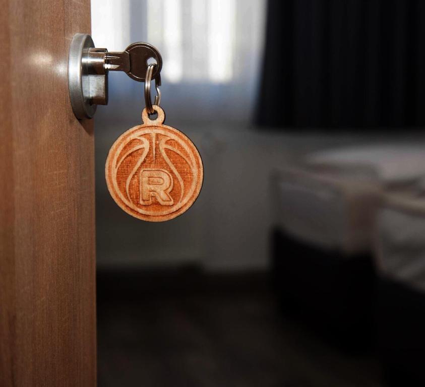 Postel nebo postele na pokoji v ubytování Apartments R Sport boutique