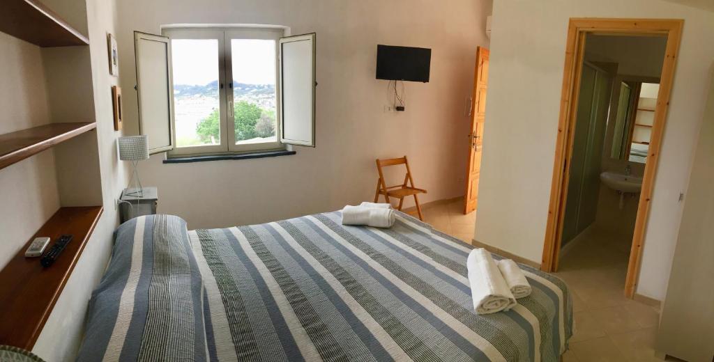 Postel nebo postele na pokoji v ubytování Harbour View B&B