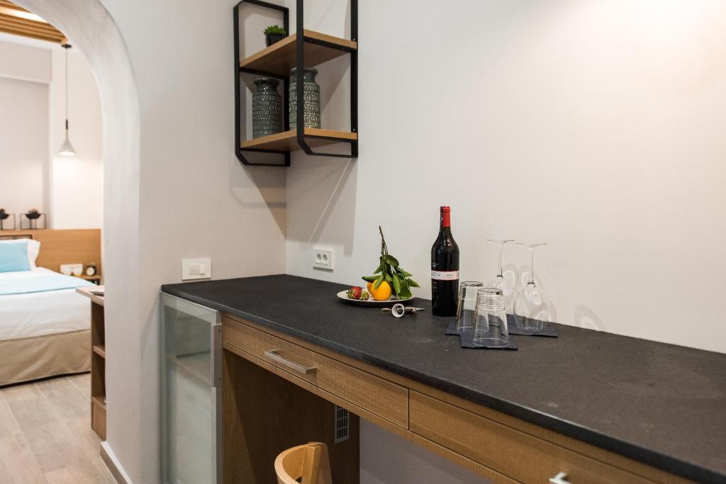 Postel nebo postele na pokoji v ubytování Harismari Cozy Hotel
