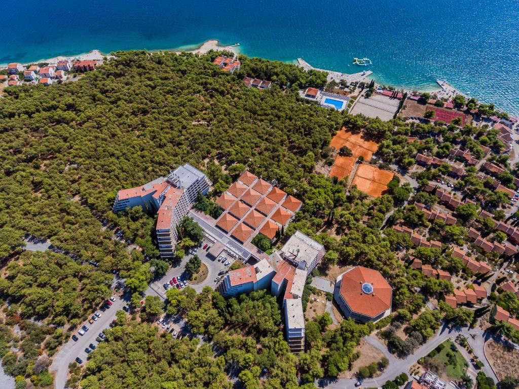an aerial view of a house on a island at Hotel Medena Budget in Trogir