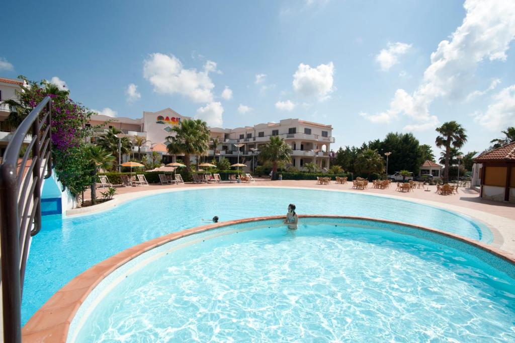 Bazén v ubytování Oasiclub Hotel nebo v jeho okolí