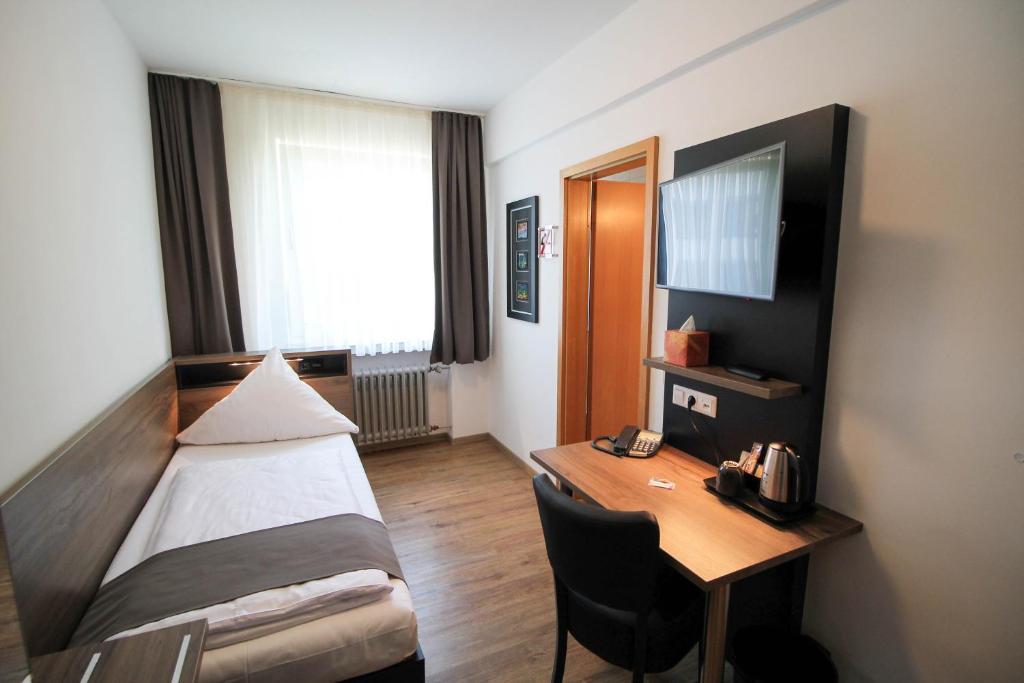 TV/Unterhaltungsangebot in der Unterkunft Center Hotel Essen