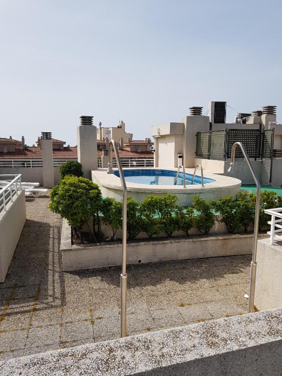 Bazén v ubytovaní El Pescador Park Cozy Apartment alebo v jeho blízkosti