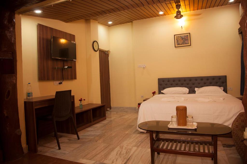 Postel nebo postele na pokoji v ubytování Om Sai Villa Guesthouse