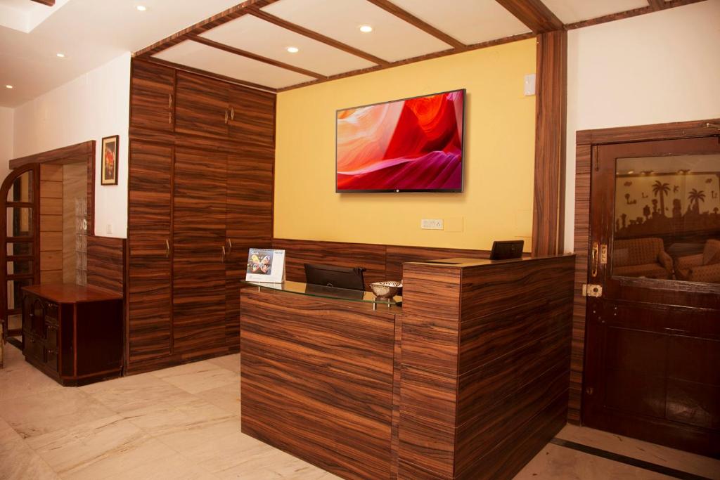 TV a/nebo společenská místnost v ubytování Om Sai Villa Guesthouse
