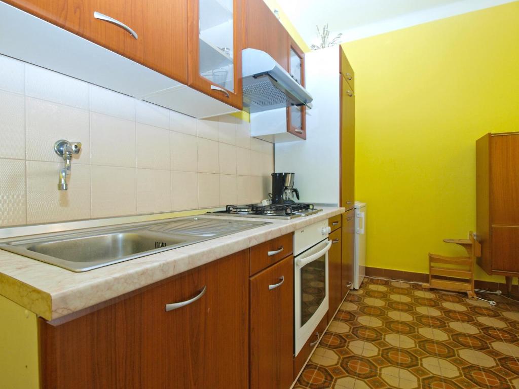 Kuchyňa alebo kuchynka v ubytovaní Apartment Mario 1622