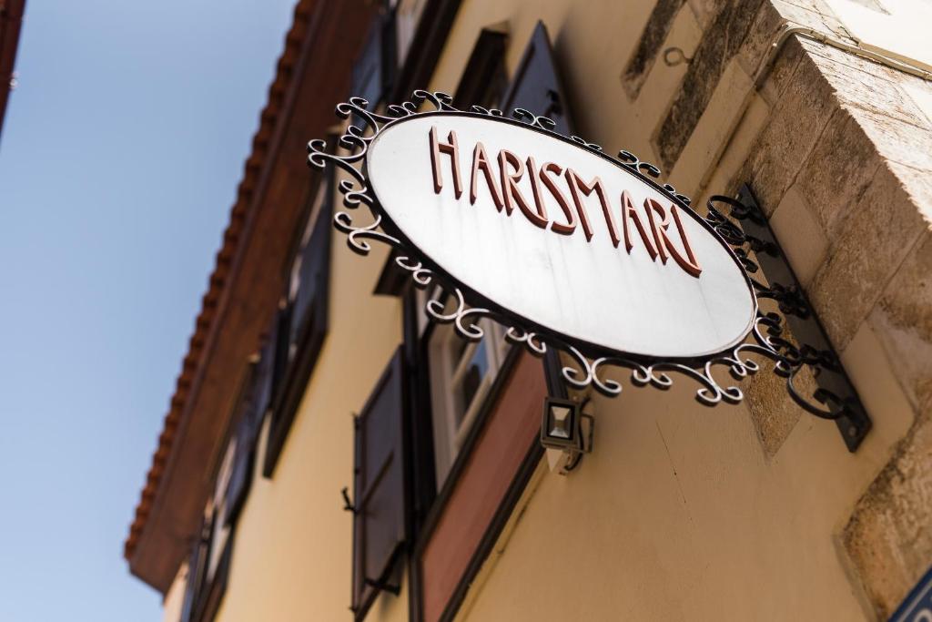 Certifikát, hodnocení, plakát nebo jiný dokument vystavený v ubytování Harismari Cozy Hotel